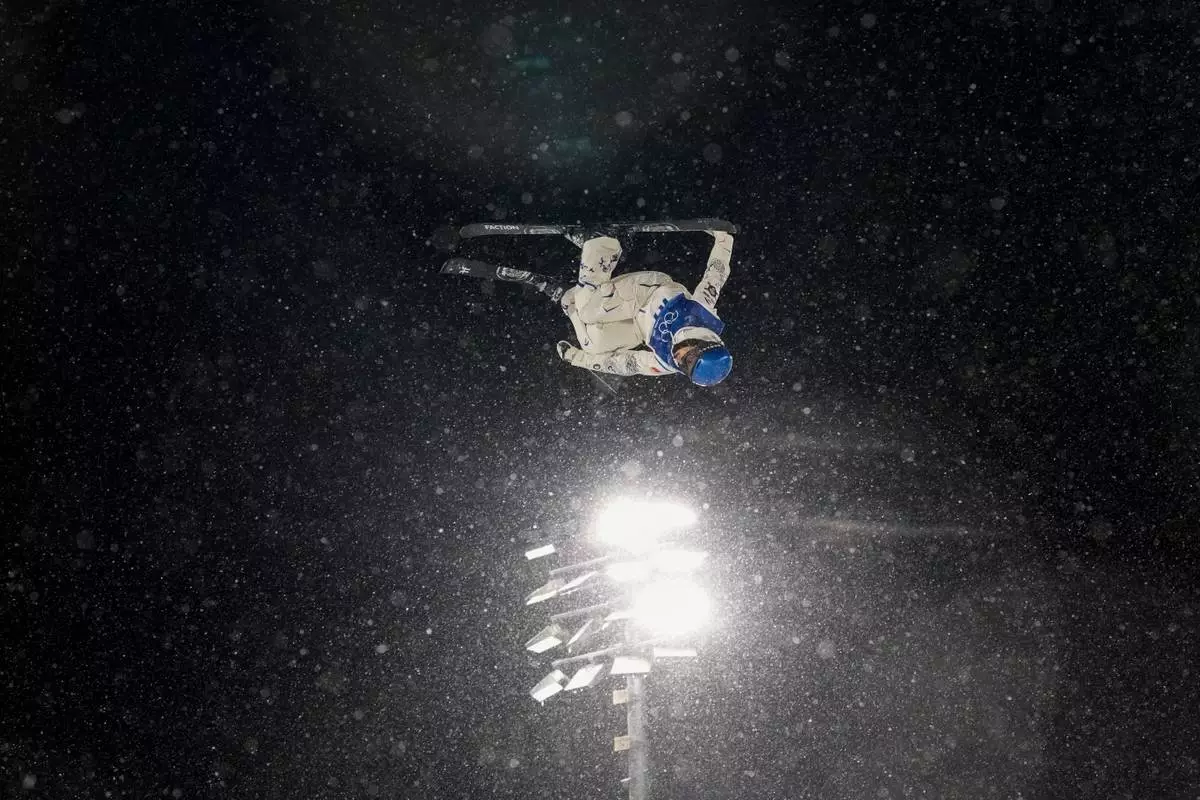 China's Eileen Gu competes during the women's freestyle skiing big air finals at the 2026 Winter Olympics, in Livigno, Italy, Monday, Feb. 16, 2026. (AP Photo/Abbie Parr)