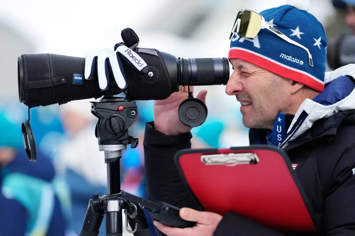 Armin Auchentaller, United States head biathlon coach, watches a training session at the 2026 Winter Olympics in Anterselva, Italy, Saturday, Feb. 7, 2026. (AP Photo/Mosa'ab Elshamy)