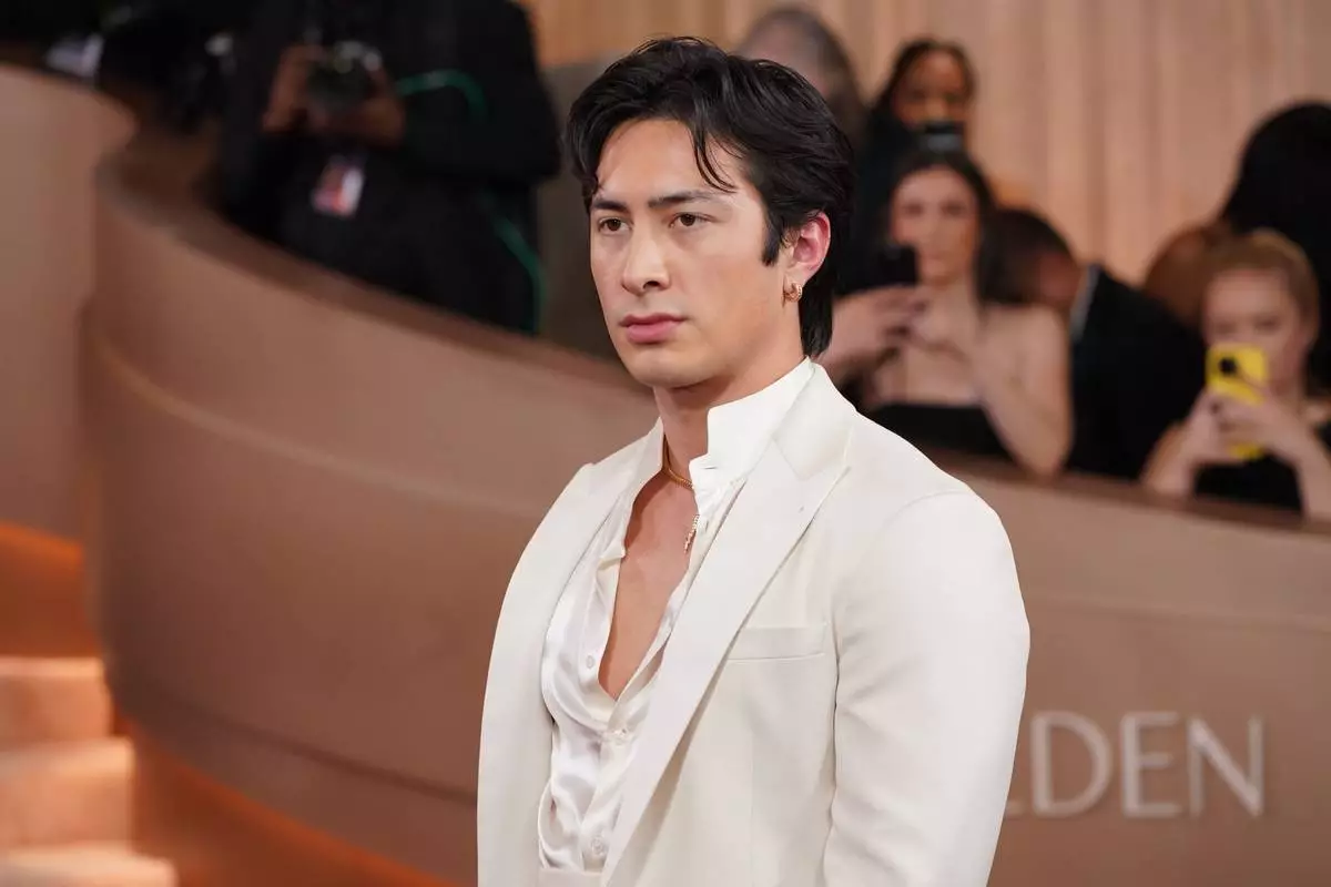 FILE - Hudson Williams arrives at the 83rd Golden Globes, Jan. 11, 2026, at the Beverly Hilton in Beverly Hills, Calif. (Photo by Jordan Strauss/Invision/AP, File)
