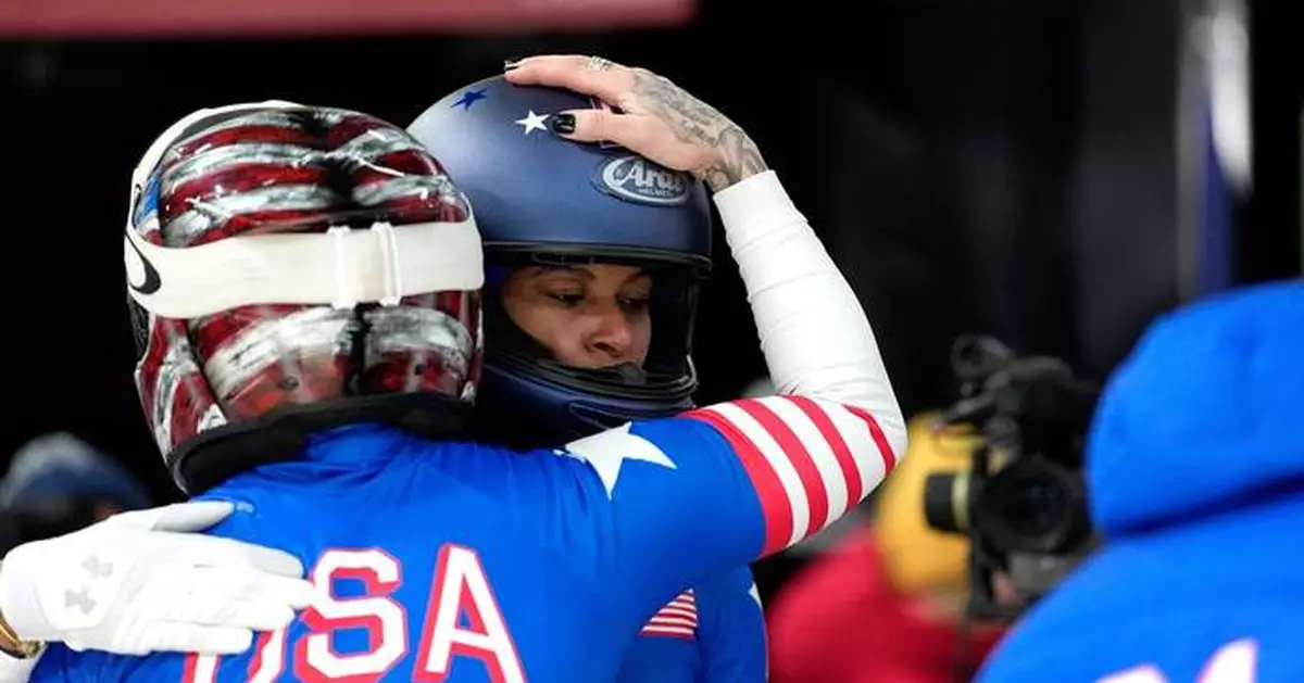 Americans Humphries Armbruster, Jones 3rd at midpoint of bobsled race. Germany's Nolte, Levi lead