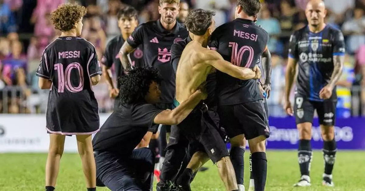 Lionel Messi knocked down as fans storm the pitch during Inter Miami friendly in Puerto Rico