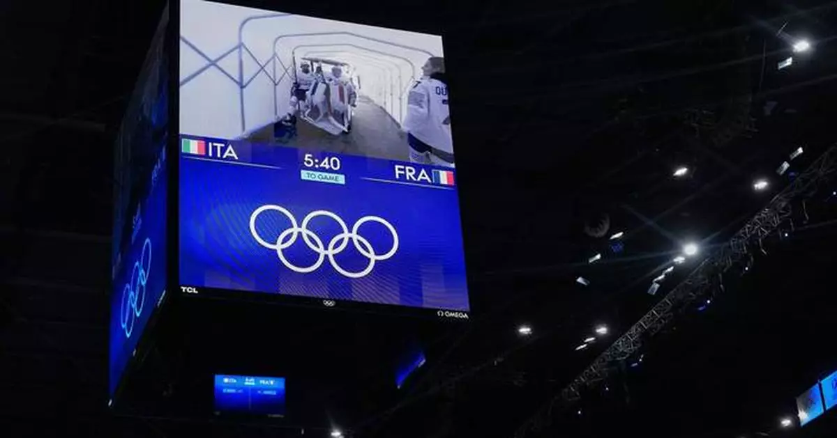 Goaltenders get golf cart rides to the ice for hockey games at the Milan Cortina Olympics