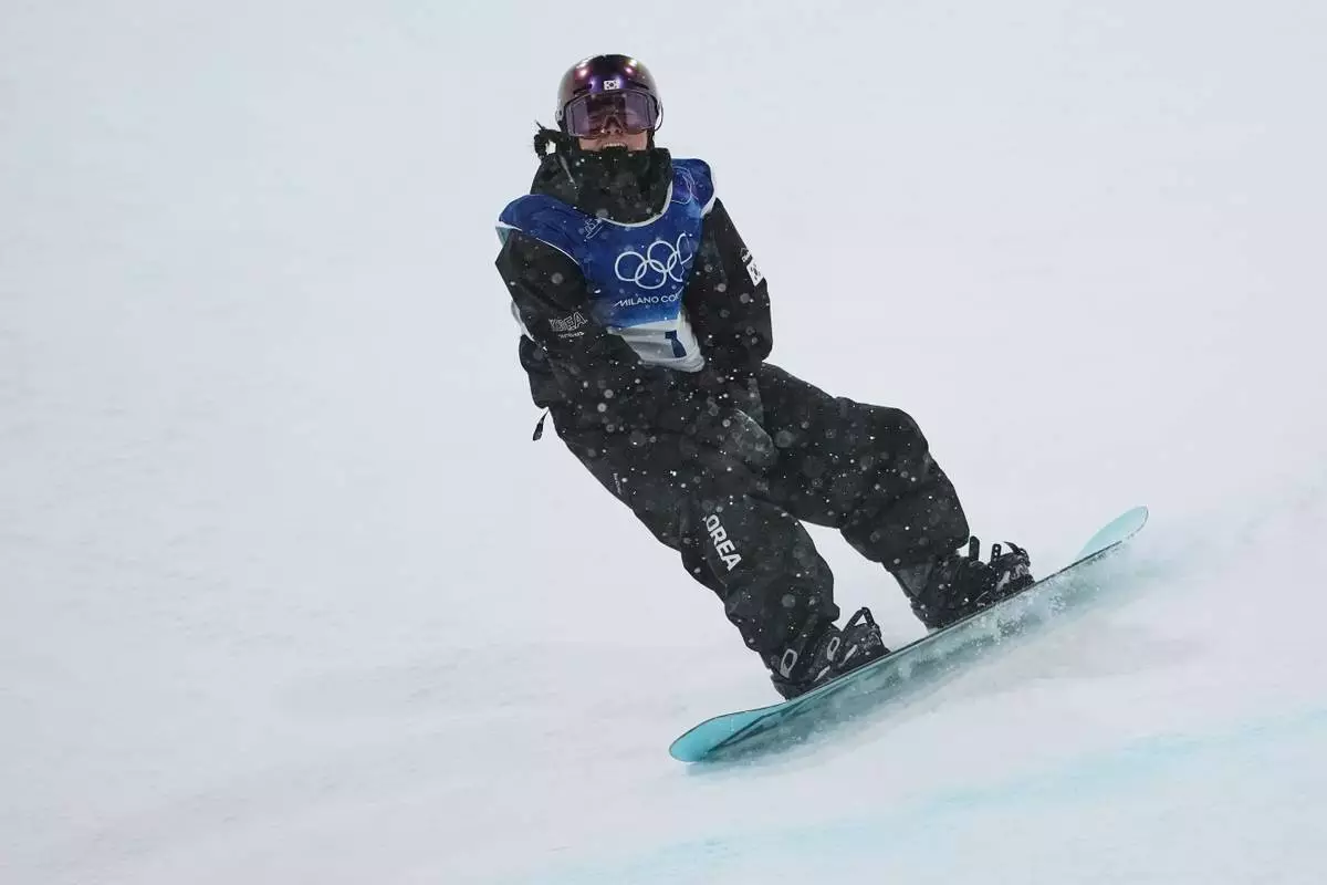 South Korea's Choi Ga-on reacts to her run during the women's snowboarding halfpipe finals at the 2026 Winter Olympics, in Livigno, Italy, Thursday, Feb. 12, 2026. (AP Photo/Lindsey Wasson)