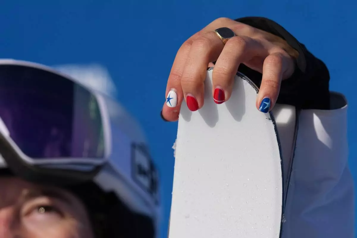 United States' Jaelin Kauf waits for her score during the women's freestyle skiing moguls finals at the 2026 Winter Olympics, in Livigno, Italy, Wednesday, Feb. 11, 2026. (AP Photo/Gregory Bull)