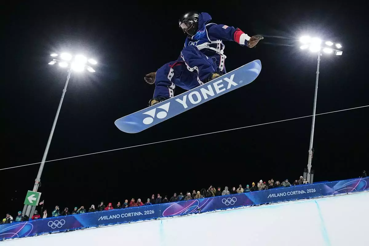 United States' Alessandro Barbieri competes during the men's snowboarding halfpipe qualifications at the 2026 Winter Olympics, in Livigno, Italy, Wednesday, Feb. 11, 2026. (AP Photo/Gregory Bull)