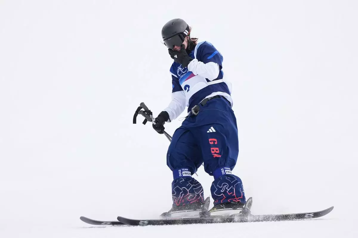 Britain's Kirsty Muir reacts during the women's freestyle skiing slopestyle finals at the 2026 Winter Olympics, in Livigno, Italy, Monday, Feb. 9, 2026. (AP Photo/Gregory Bull)