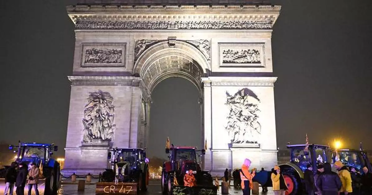 Paris police fatally shoot a knife-wielding man who tried to attack officers at Arc de Triomphe