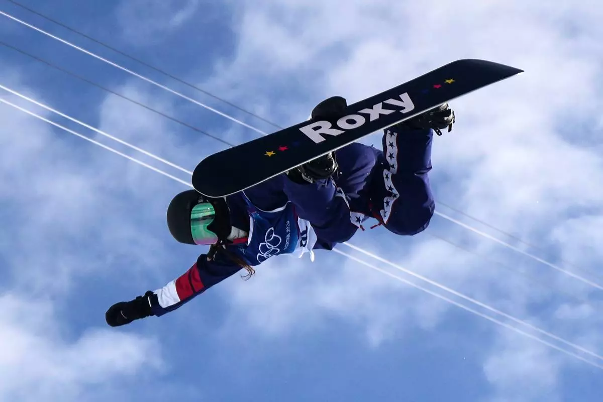 United States' Chloe Kim competes during the women's snowboarding halfpipe qualifications at the 2026 Winter Olympics, in Livigno, Italy, Wednesday, Feb. 11, 2026. (AP Photo/Abbie Parr)