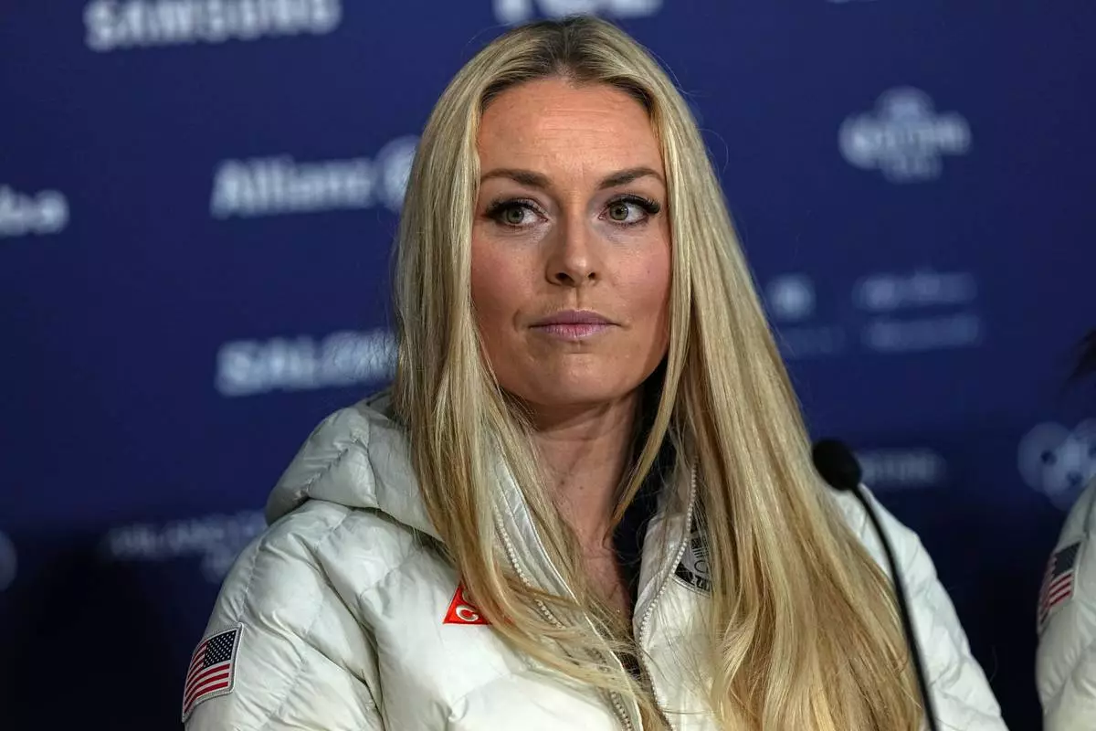 United States' Lindsey Vonn attends a press conference by the U.S. ski team at the 2026 Winter Olympics, in Cortina d'Ampezzo, Italy, Tuesday, Feb. 3, 2026. (AP Photo/Fatima Shbair)