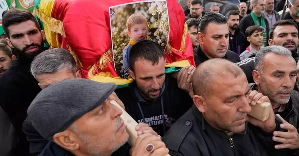Village in southern Lebanon buries a child and father killed in Israeli drone strike
