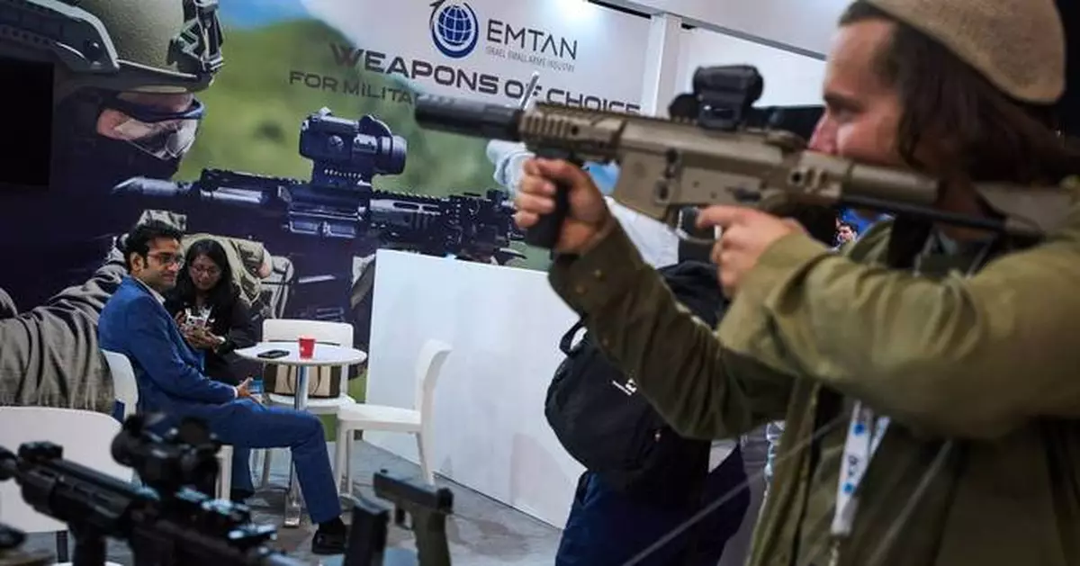 Photos of rifles, drones and missile footage at the Defense Tech Expo Israel 2026