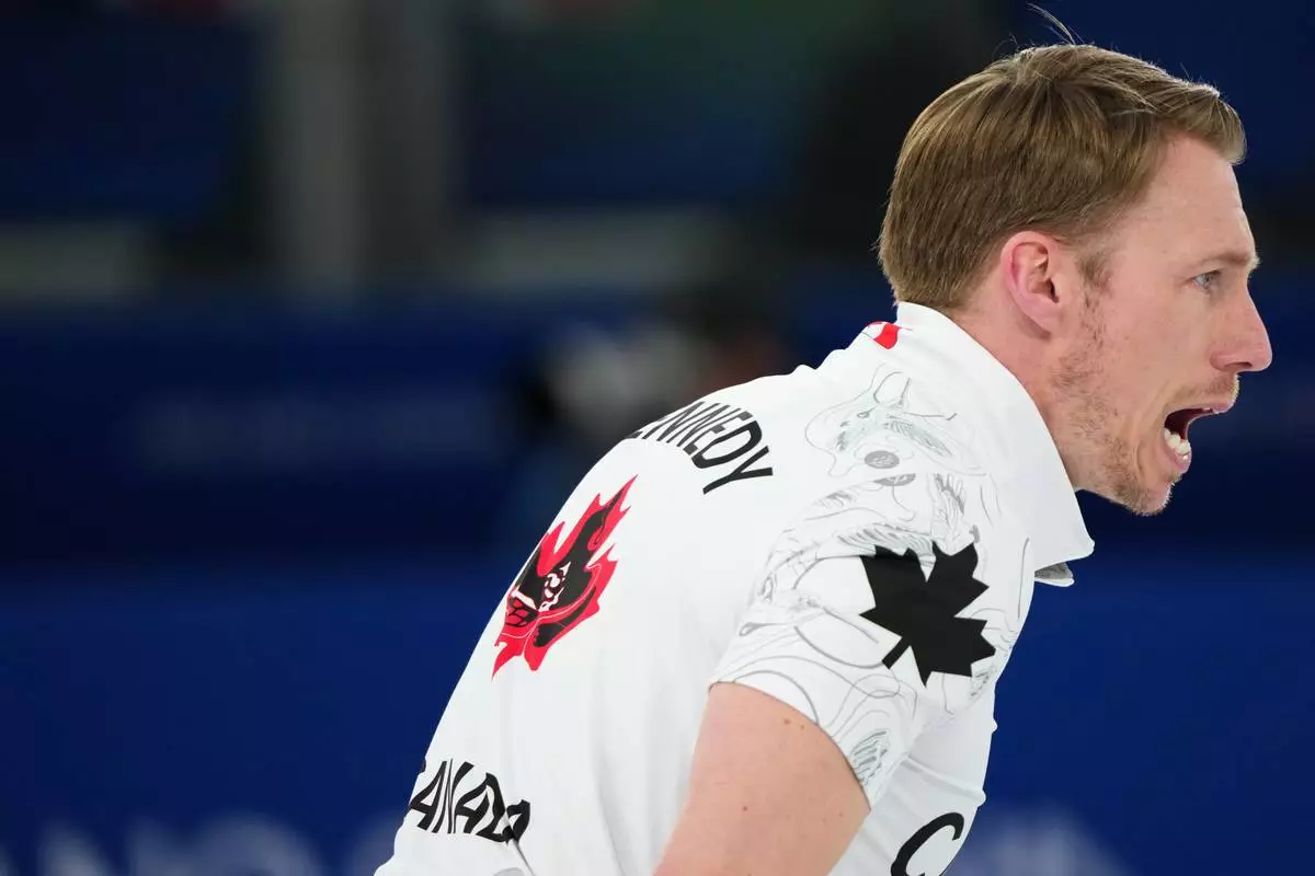 Canada's Marc Kennedy reacts during a men's curling gold medal match between Britain and Canada, at the 2026 Winter Olympics, in Cortina d'Ampezzo, Italy, Saturday, Feb. 21, 2026. (AP Photo/Misper Apawu)