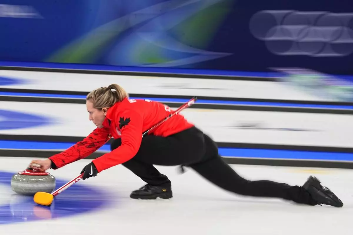 Canada's Rachel Homan competes during a women's curling bronze medal match between Canada and the United States, at the 2026 Winter Olympics, in Cortina d'Ampezzo, Italy, Saturday, Feb. 21, 2026. (AP Photo/Fatima Shbair)