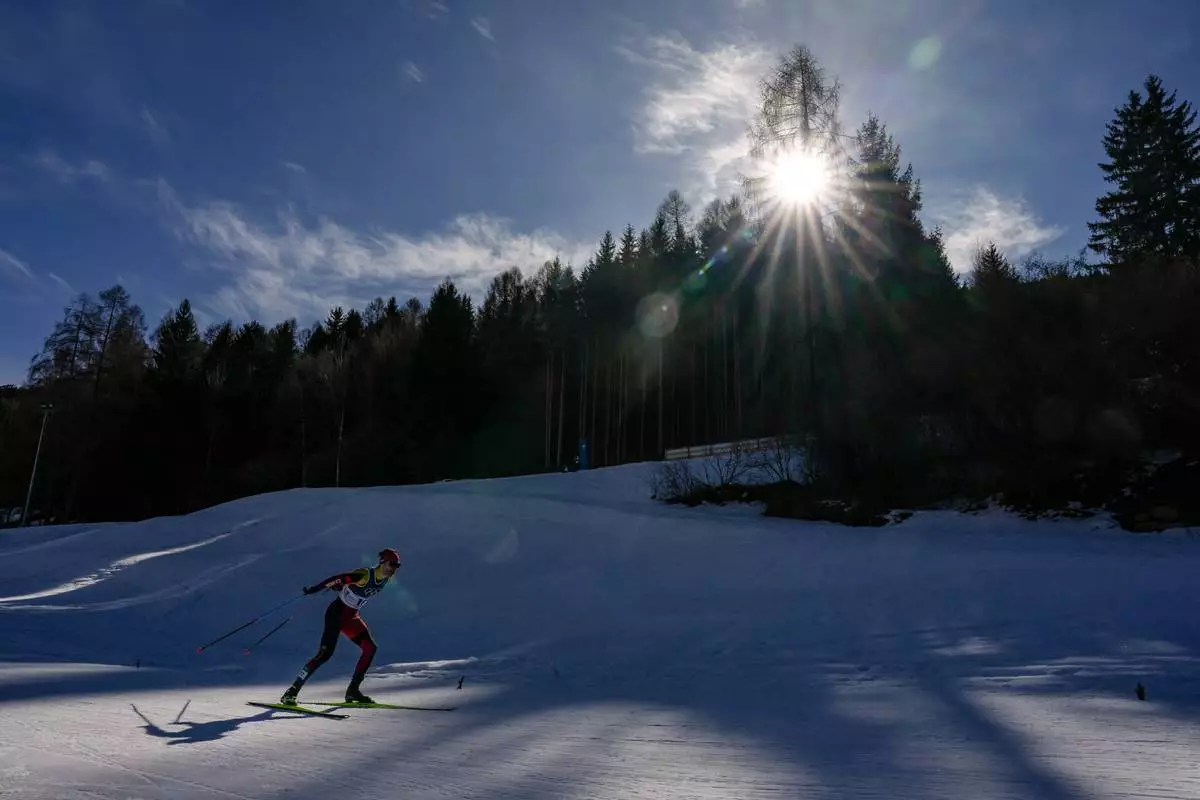 Remi Drolet, of Canada, competes in the cross country skiing men's 10km interval start free at the 2026 Winter Olympics, in Tesero, Italy, Thursday, Feb. 12, 2026. (AP Photo/Matthias Schrader)