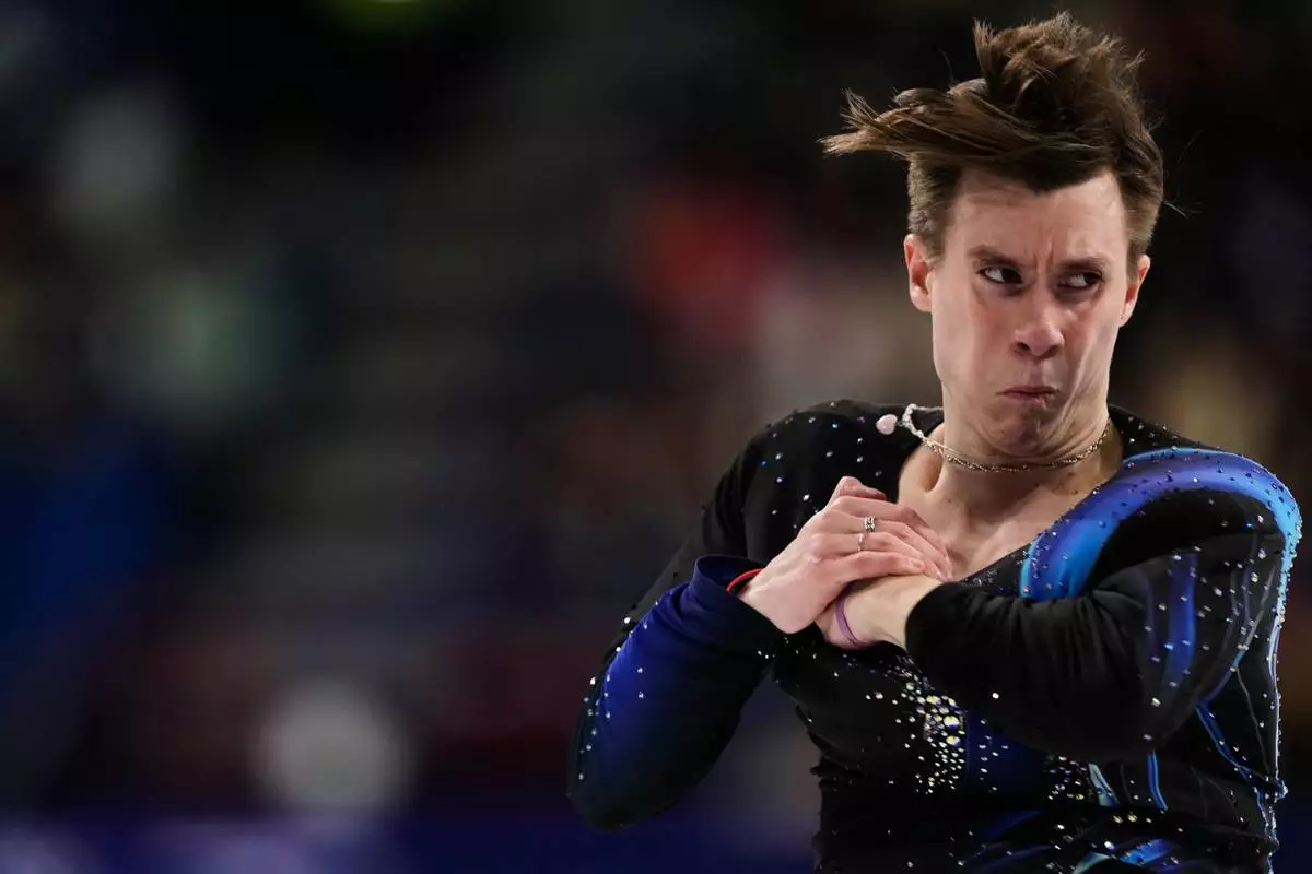 Vladimir Samoilov of Poland competes during the men's free skate program in figure skating at the 2026 Winter Olympics, in Milan, Italy, Friday, Feb. 13, 2026. (AP Photo/Natacha Pisarenko)