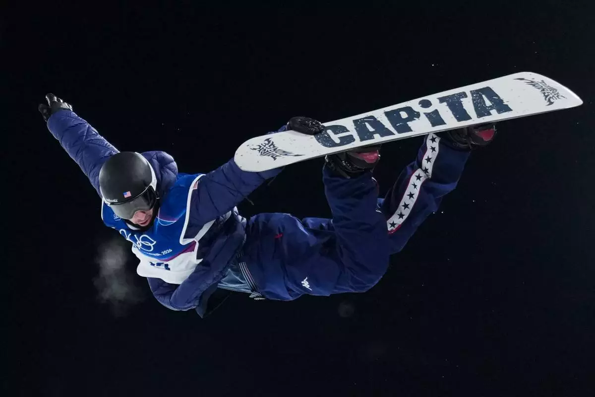 United States' Chase Josey competes during the men's snowboarding halfpipe finals at the 2026 Winter Olympics, in Livigno, Italy, Friday, Feb. 13, 2026. (AP Photo/Abbie Parr)