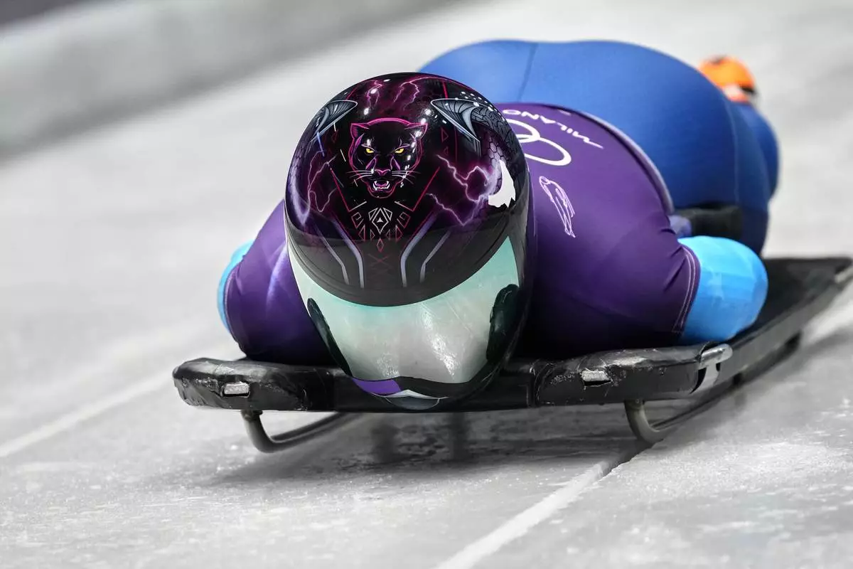 United States' Mystique Ro starts for a women's skeleton training session at the 2026 Winter Olympics, in Cortina d'Ampezzo, Italy, Monday, Feb. 9, 2026. (AP Photo/Alessandra Tarantino)