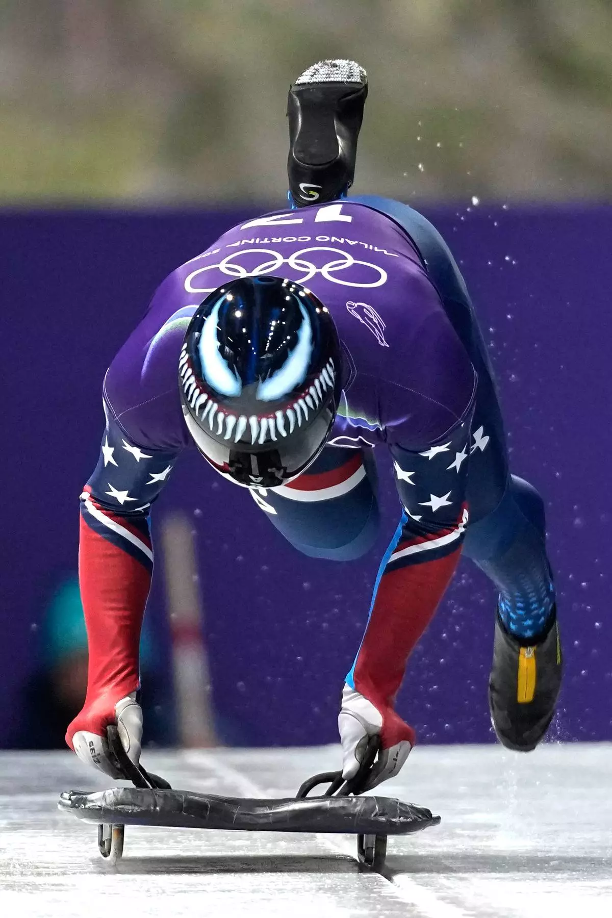 United State's Austin Florian starts for a men's skeleton training session at the 2026 Winter Olympics, in Cortina d'Ampezzo, Italy, Monday, Feb. 9, 2026. (AP Photo/Alessandra Tarantino)