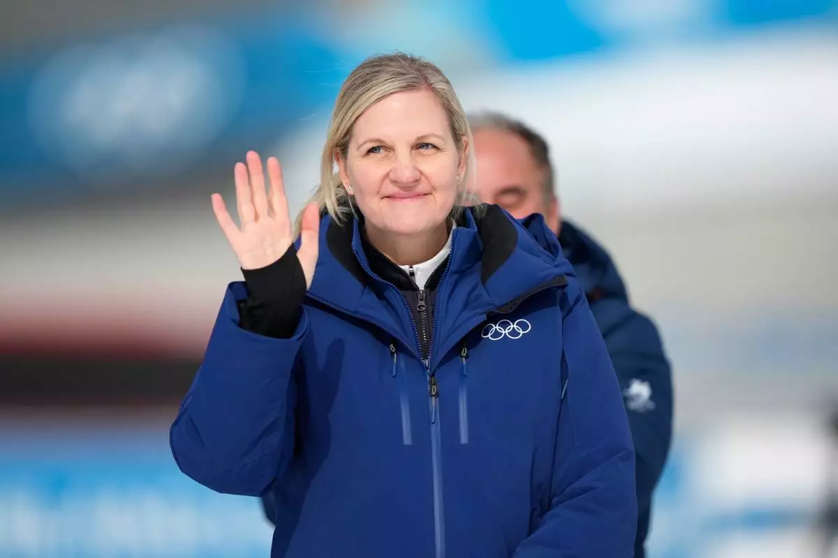 IOC President Kirsty Coventry gestures at a reallocation medals ceremony at the 2026 Winter Olympics in Anterselva, Italy, Sunday, Feb. 15, 2026. (AP Photo/Mosa'ab Elshamy)