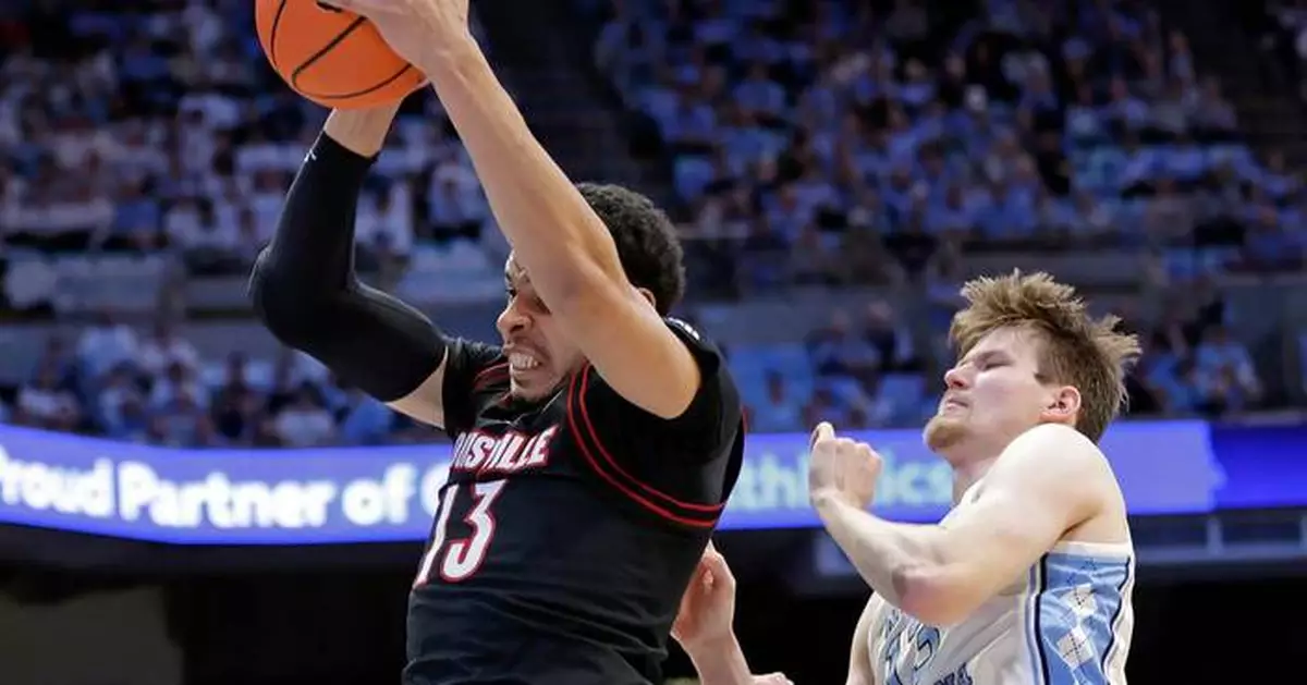 Seth Trimble scores a career-high 30 points as No. 18 UNC holds off No. 24 Louisville 77-74