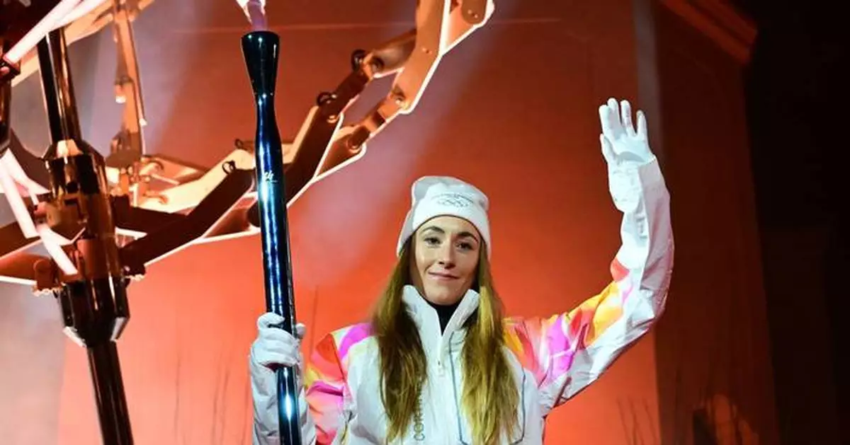 Sofia Goggia lights the cauldron in Cortina after helping Italy secure Olympic hosting rights