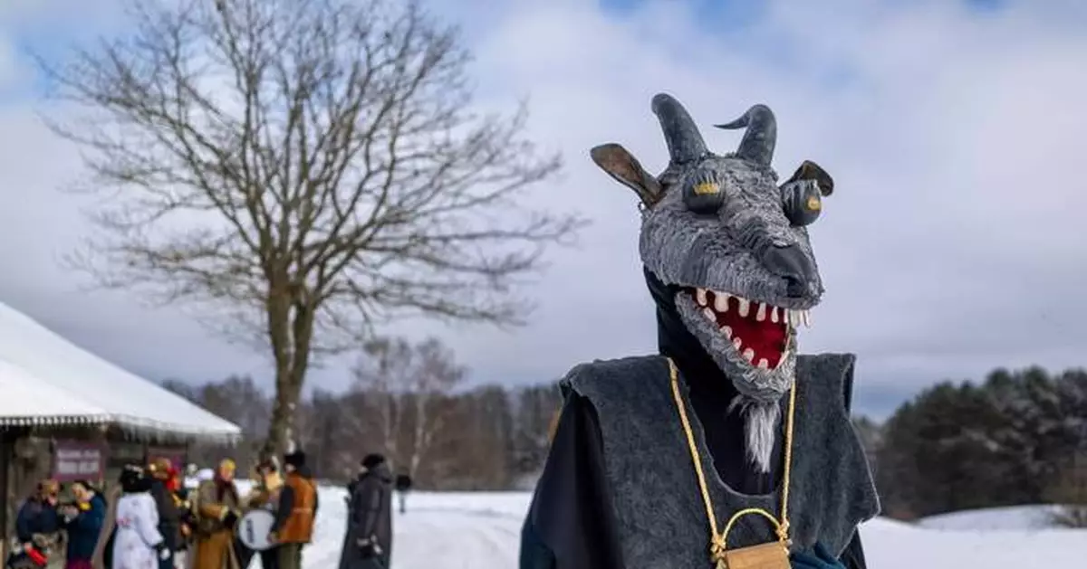 Photos show masked revelers celebrating Shrovetide in Lithuania