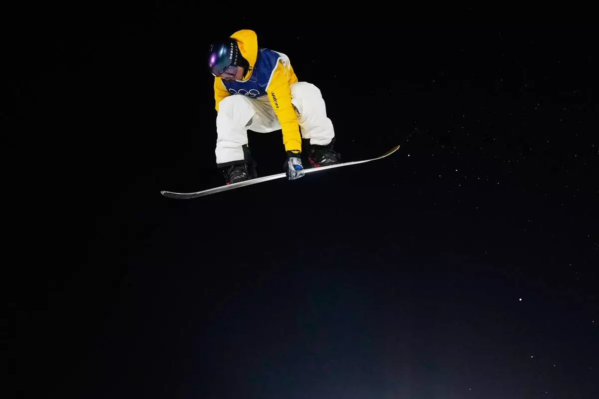Australia's Valentino Guseli competes in men's snowboard big air qualifications at the 2026 Winter Olympics, in Livigno, Italy, Thursday, Feb. 5, 2026. (AP Photo/Lindsey Wasson)