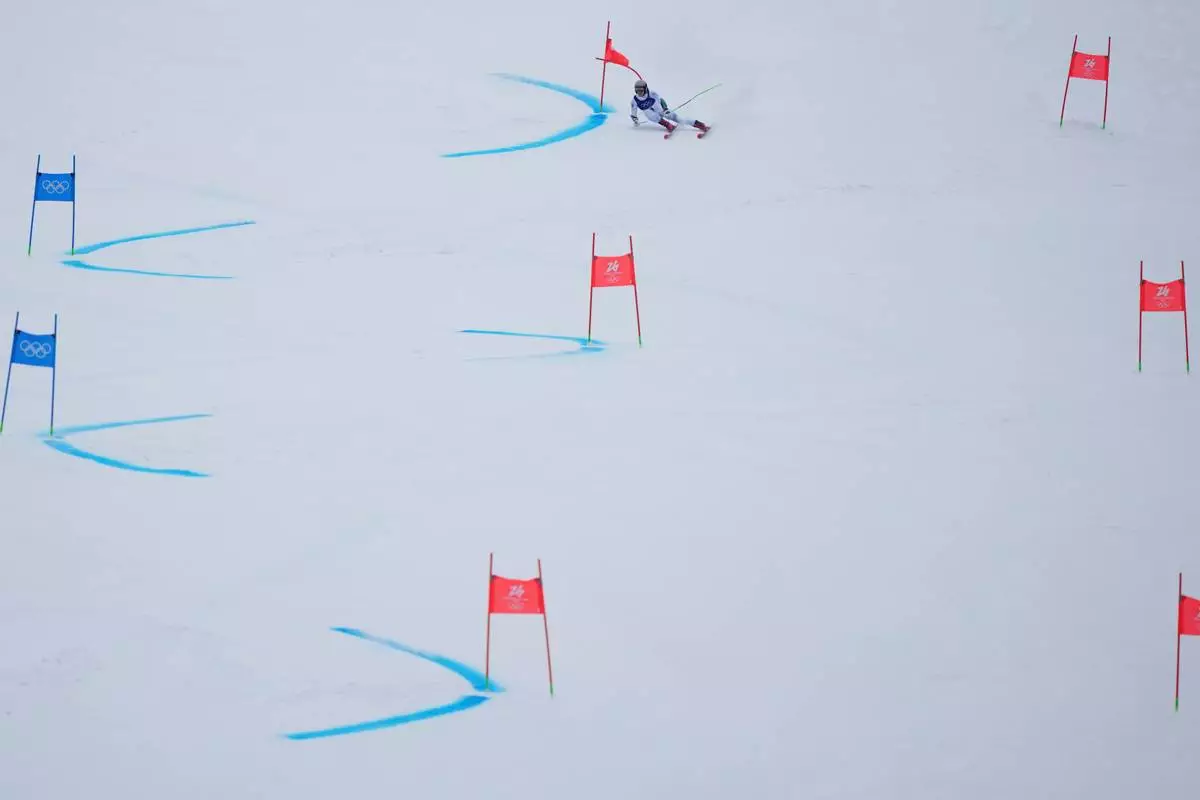 Brazil's Lucas Pinheiro Braathen competes during an alpine ski, men's giant slalom race, at the 2026 Winter Olympics, in Bormio, Italy, Saturday, Feb. 14, 2026. (AP Photo/Julia Demaree Nikhinson)
