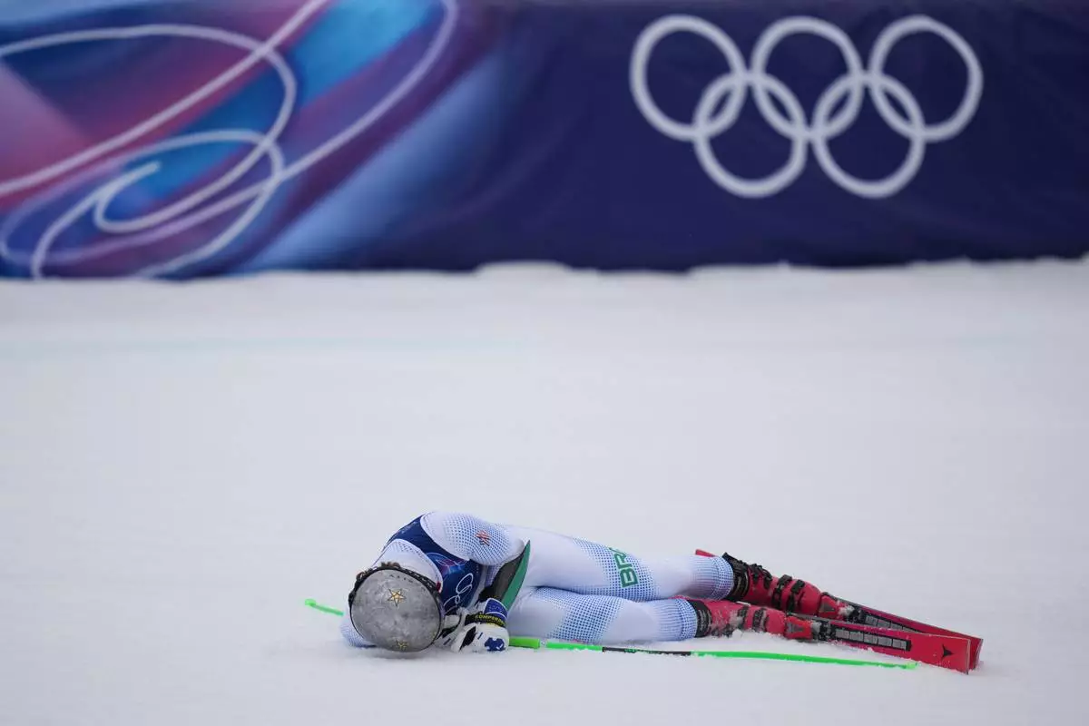 Brazil's Lucas Pinheiro Braathen celebrates at the finish area of an alpine ski, men's giant slalom race, at the 2026 Winter Olympics, in Bormio, Italy, Saturday, Feb. 14, 2026. (AP Photo/Julia Demaree Nikhinson)