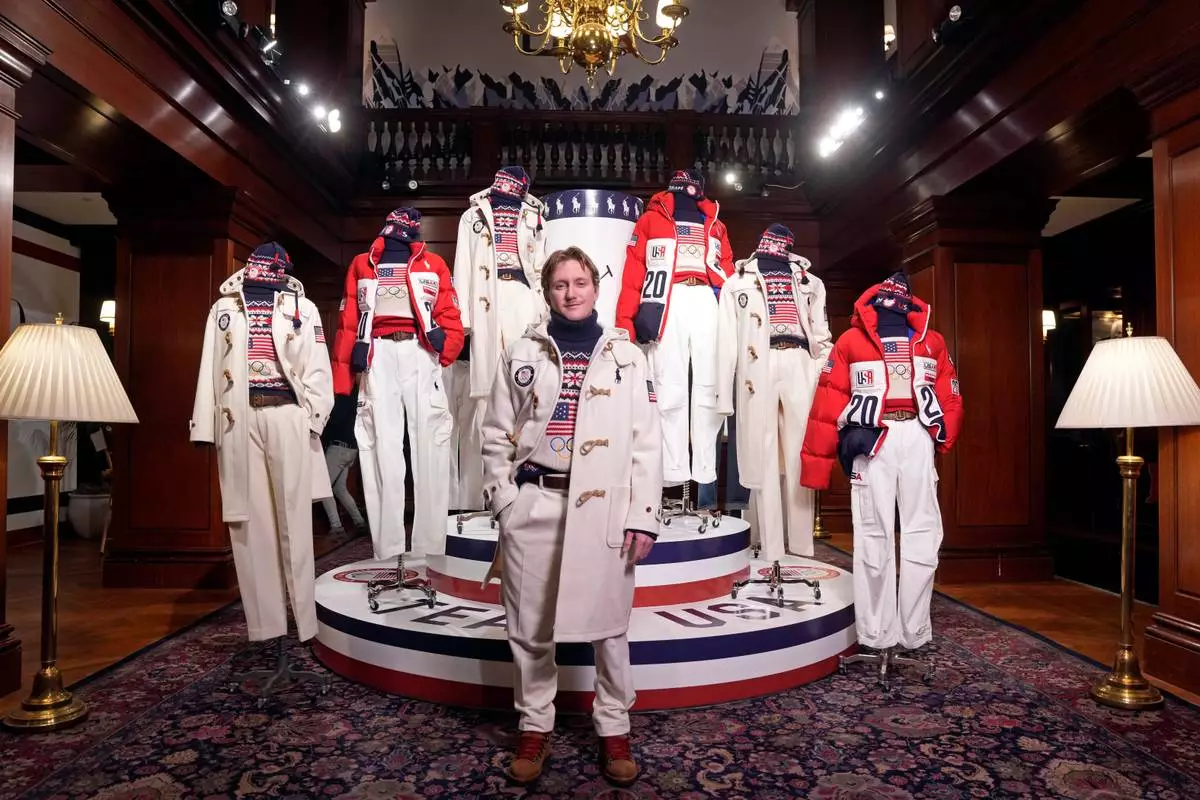 FILE - Olympic snowboarder Red Gerard unveils Ralph Lauren's Team USA opening ceremony uniform for the 2026 Milan Cortina Winter Olympics at Ralph Lauren headquarters, Dec. 3, 2025, in New York. (Photo by Charles Sykes/Invision/AP, File)