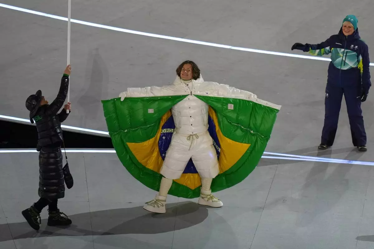 Lucas Pinheiro Braathen attends the Olympic opening ceremony at the 2026 Winter Olympics, in Milan, Italy, Friday, Feb. 6, 2026. (AP Photo/Stephanie Scarbrough)