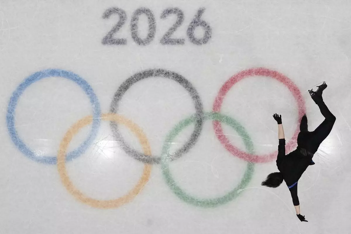 Kyrylo Marsak of Ukraine competes during the men's free skate program in figure skating at the 2026 Winter Olympics, in Milan, Italy, Friday, Feb. 13, 2026. (AP Photo/Christophe Ena)