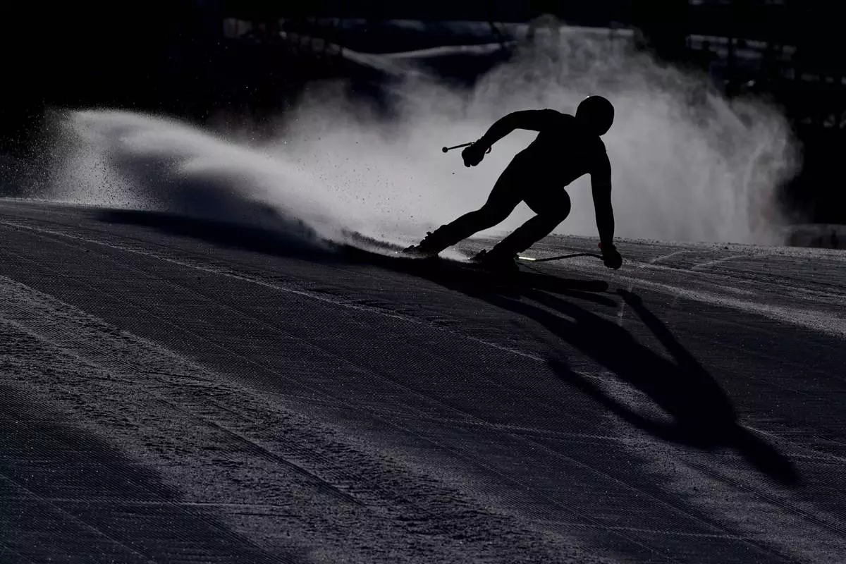 Austria's Daniel Hemetsberger comes into the finish area of an alpine ski men's downhill portion of a team combined race, at the 2026 Winter Olympics, in Bormio, Italy, Monday, Feb. 9, 2026. (AP Photo/Rebecca Blackwell)