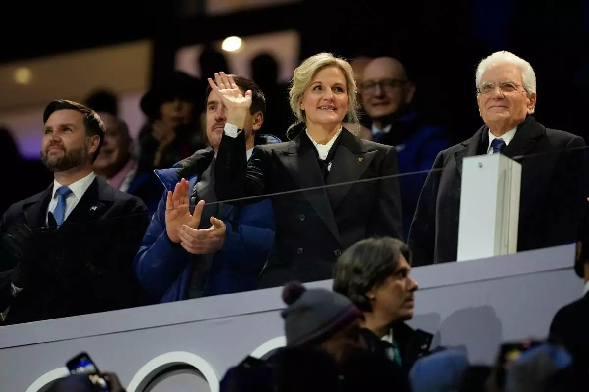 U.S. Vice President JD Vance, left, IOC President Kirsty Coventry, third from left, and Italian President Sergio Mattarella, right, attend the Olympic opening ceremony at the 2026 Winter Olympics, in Milan, Italy, Friday, Feb. 6, 2026. (AP Photo/Ashley Landis)