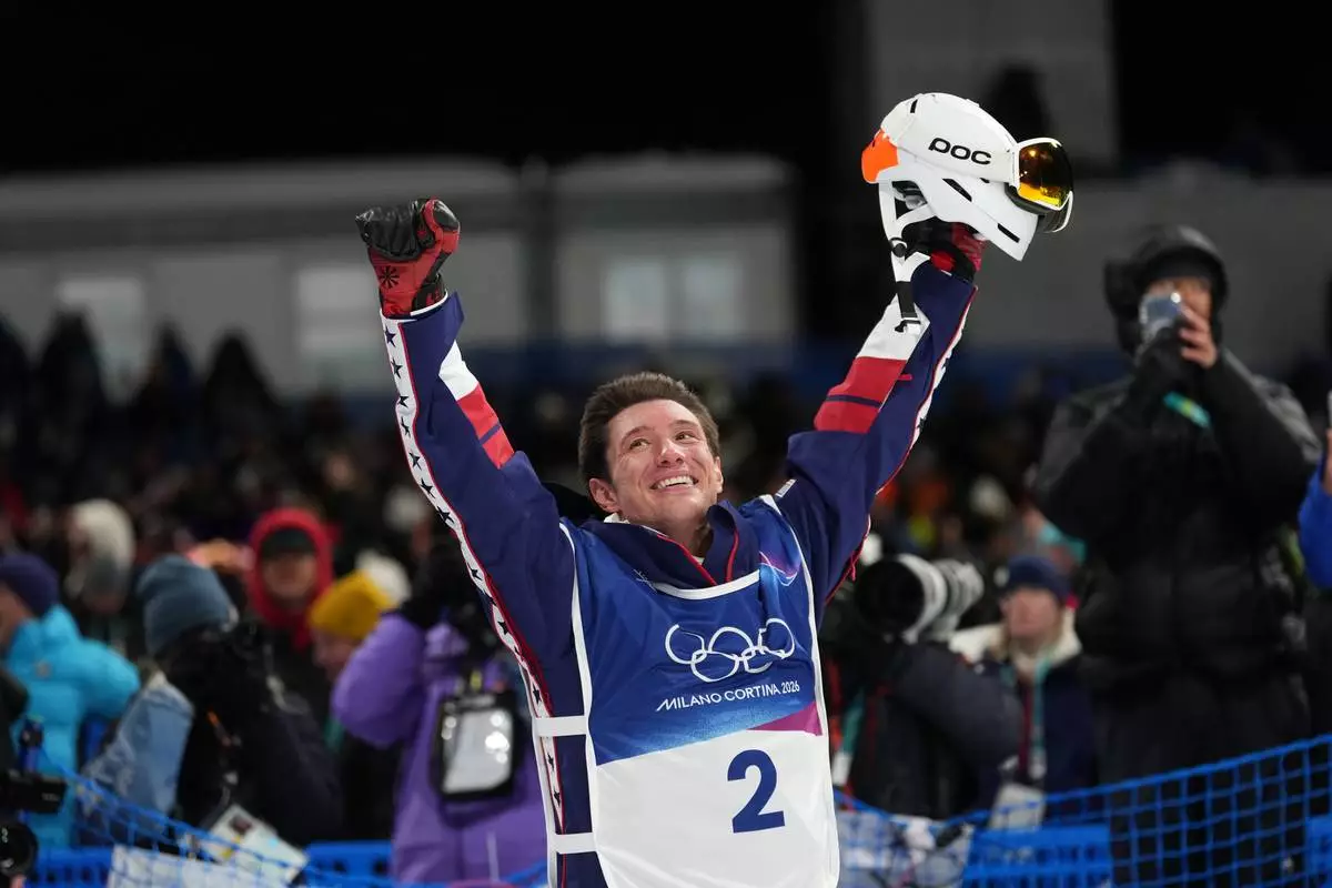 Gold medalist United States' Alex Ferreira celebrates his win in the men's freestyle skiing halfpipe finals at the 2026 Winter Olympics, in Livigno, Italy, Friday, Feb. 20, 2026. (AP Photo/Lindsey Wasson)