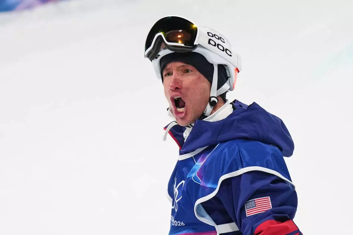 United States' Alex Ferreira reacts to his score during the men's freestyle skiing halfpipe finals at the 2026 Winter Olympics, in Livigno, Italy, Friday, Feb. 20, 2026. (AP Photo/Abbie Parr)