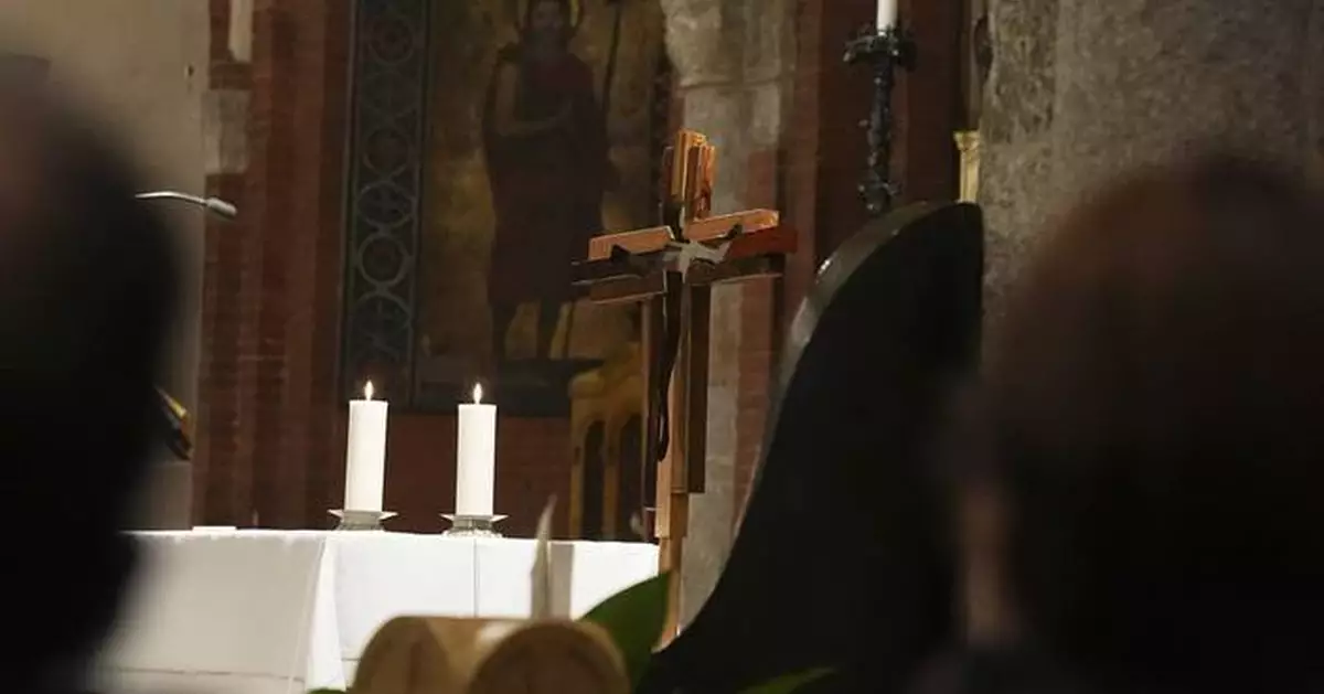 Catholic cross like no other is a beacon of unity in Olympic host city Milan
