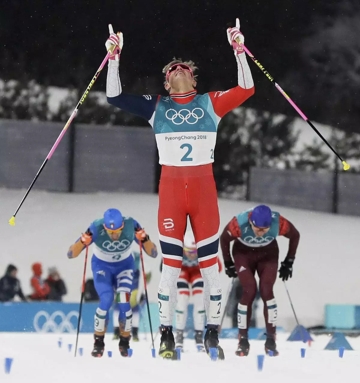FILE - Johannes Hoesflot Klaebo, of Norway, celebrates after winning the men's cross-country skiing sprint classic at the 2018 Winter Olympics in Pyeongchang, South Korea, Feb. 13, 2018. (AP Photo/Kirsty Wigglesworth, File)