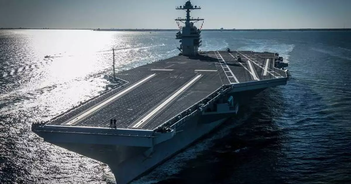 Second US aircraft carrier is being sent to the Middle East, AP source says, as Iran tensions high