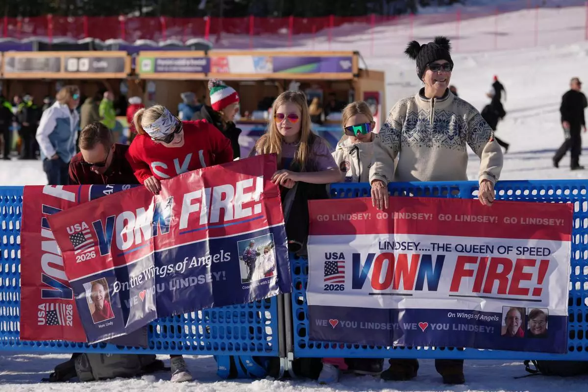 United States' Lindsey Vonn's aunt Lisa Krohn, right, is seen at the finish area of an alpine ski women's downhill race, at the 2026 Winter Olympics, in Cortina d'Ampezzo, Italy, Sunday, Feb. 8, 2026. (AP Photo/Andy Wong)
