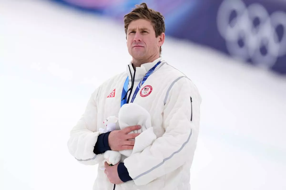 Silver medal's winner United States' Ryan Cochran Siegle attends the podium ceremony for a men's super-G race, at the 2026 Winter Olympics, in Bormio, Italy, Wednesday, Feb.11, 2026. (AP Photo/Julia Demaree Nikhinson)