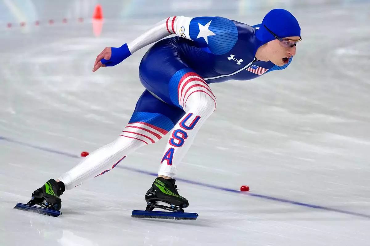 Jordan Stolz of the U.S. competes to win the gold medal in the men's 1,000 meters speedskating race at the 2026 Winter Olympics, in Milan, Italy, Wednesday, Feb. 11, 2026. (AP Photo/Ben Curtis)