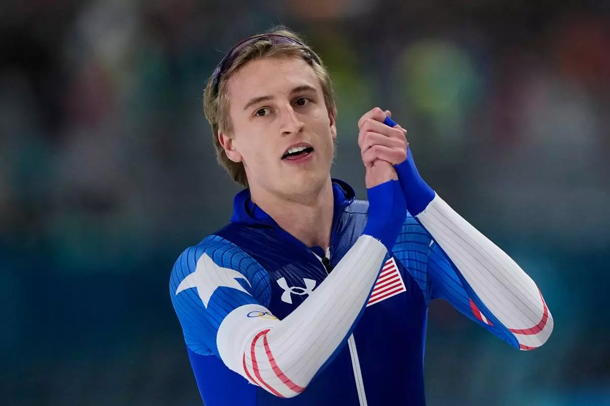 Jordan Stolz of the U.S. reacts after the men's 1,000 meters speedskating race at the 2026 Winter Olympics, in Milan, Italy, Wednesday, Feb. 11, 2026. (AP Photo/Ben Curtis)