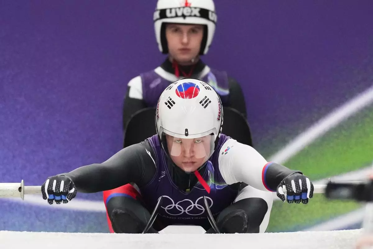 South Korea's Jung Hyesun starts for a women's Luge training session at the 2026 Winter Olympics, in Cortina d'Ampezzo, Italy, Thursday, Feb. 5, 2026. (AP Photo/Alessandra Tarantino)