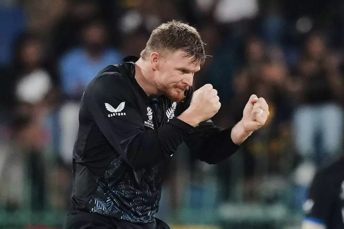 New Zealand's Glenn Phillips celebrates the wicket of Sri Lanka's Dunith Wellalage during the T20 World Cup cricket match between Sri Lanka and New Zealand in Colombo, Sri Lanka, Wednesday, Feb. 25, 2026. (AP Photo/Eranga Jayawardena)