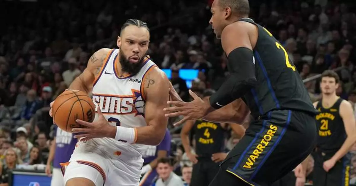 Warriors erase 14-point deficit in the fourth quarter to beat the Suns 101-97