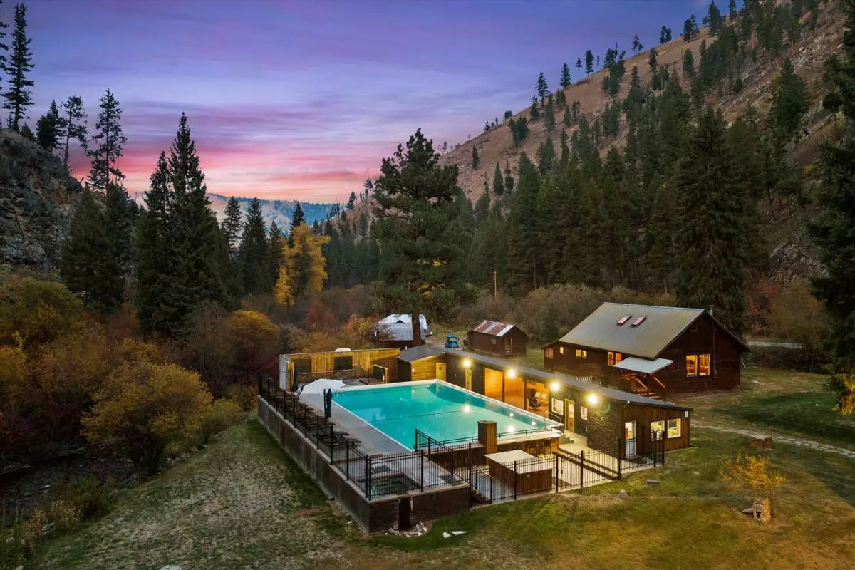 The property holds geothermal water rights from 1908 which fills a 2,046-square-foot hot springs pool, hot tub and historic soaking tubs in the bathhouse. (Photo Credit: Kiln Media)