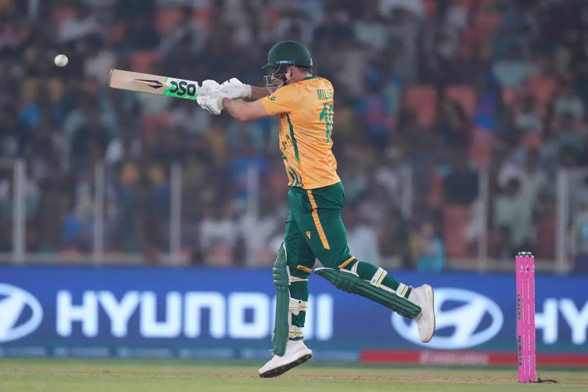 South Africa's David Miller plays a shot during the T20 World Cup cricket match between South Africa and New Zealand in Ahmedabad , India, Saturday, Feb.14, 2026. (AP Photo/ Ajit Solanki)