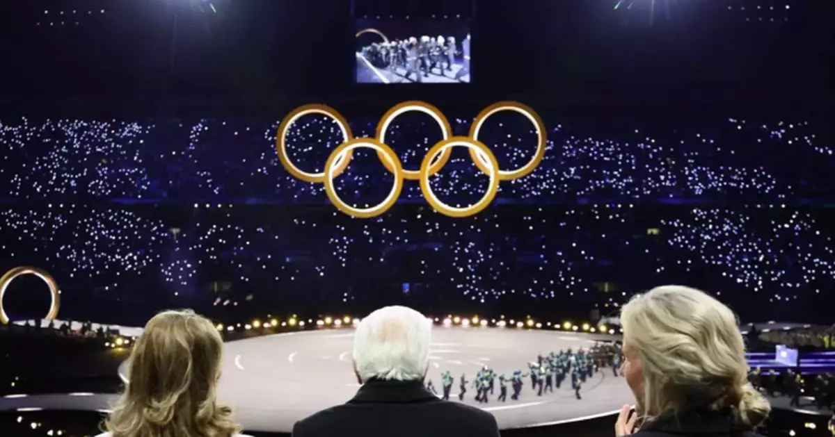 The Milan Cortina Olympics officially open with a multi-site ceremony for a spread-out Winter Games