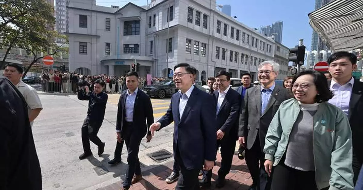 Hong Kong Officials Celebrate Chinese New Year with Household Visits Across All Districts